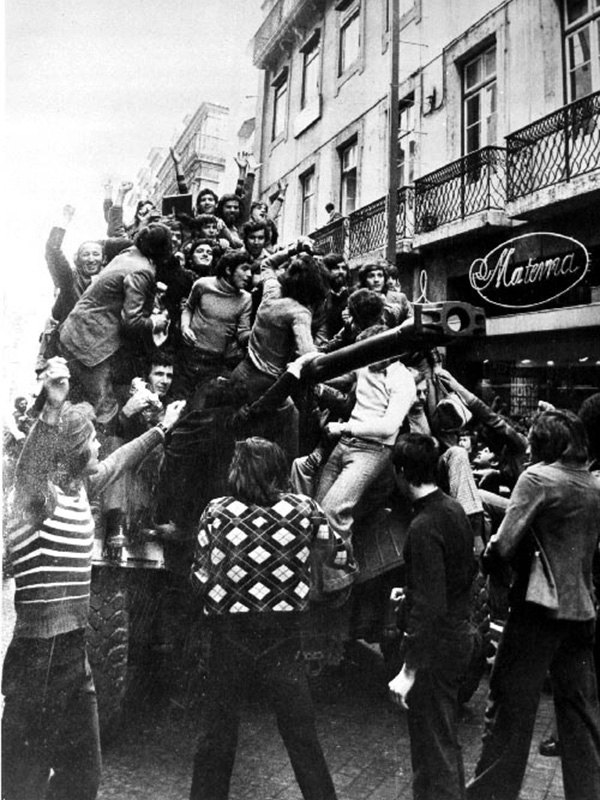 Portuguese people on an armoured car during the Carnation Revolution, 25 April 1974 (Centro de Documentação via Wikimedia Commons)