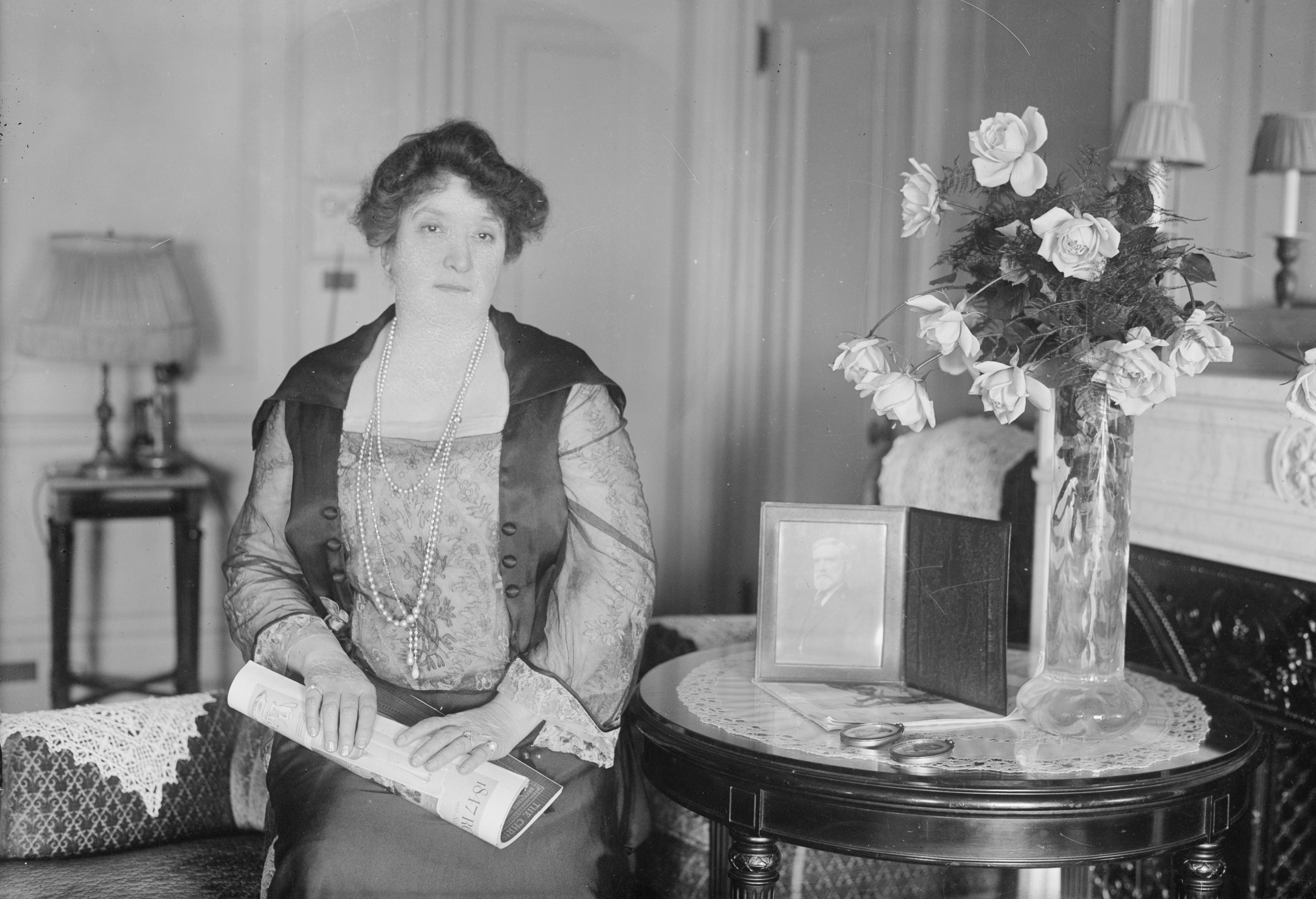 Dame Nellie Melba with a photograph of her father businessman David Mitchell 1925 George Grantham Bain Collection / Library of Congress via Wikimedia Commons