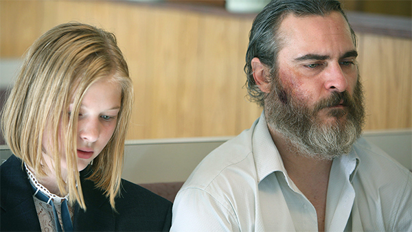 A still of Ekaterina Samsonov and Joaquin Phoenix in You Were Never Really Here (Umbrella Entertainment)